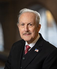 John F. Palmiere                                          